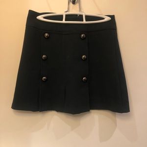 Dark green, gently used mini skirt. From Urban Outfitters. Size 4.